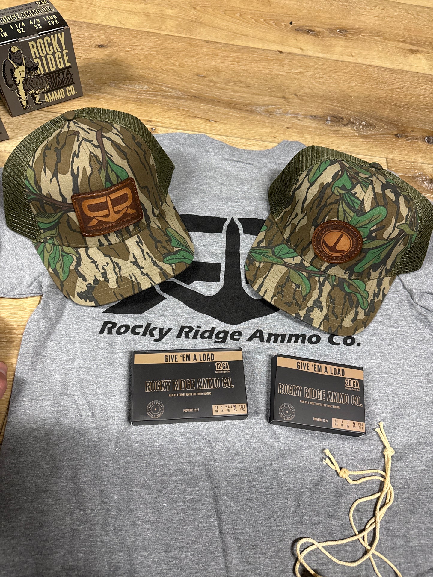 Give Em' a Load Trucker Hat